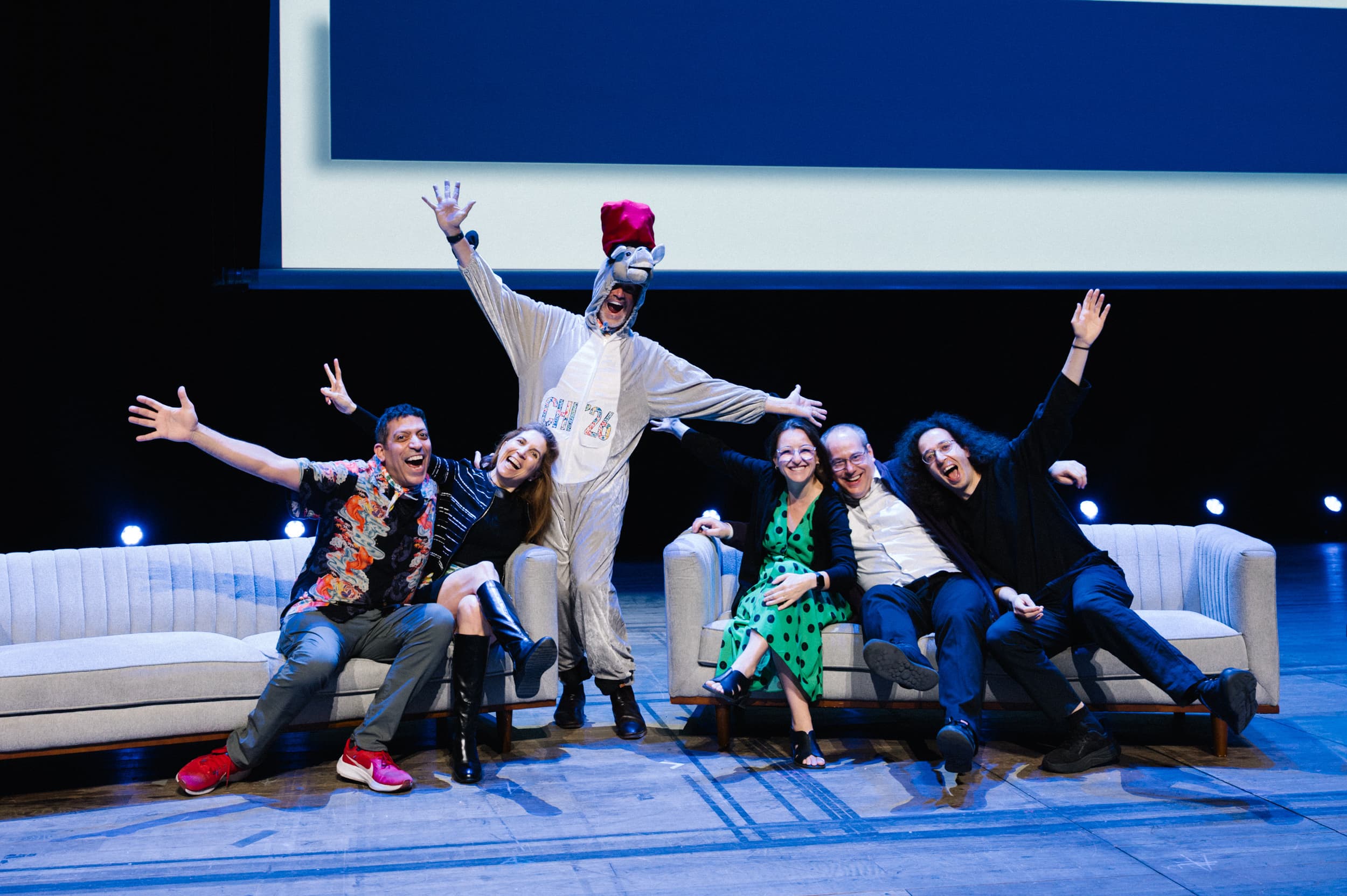 GCs TPCs and Aaron celebrating on stage, we did it!